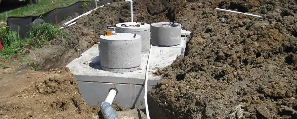 Septic system repair and installation site with tank access ports in San Mateo, CA
